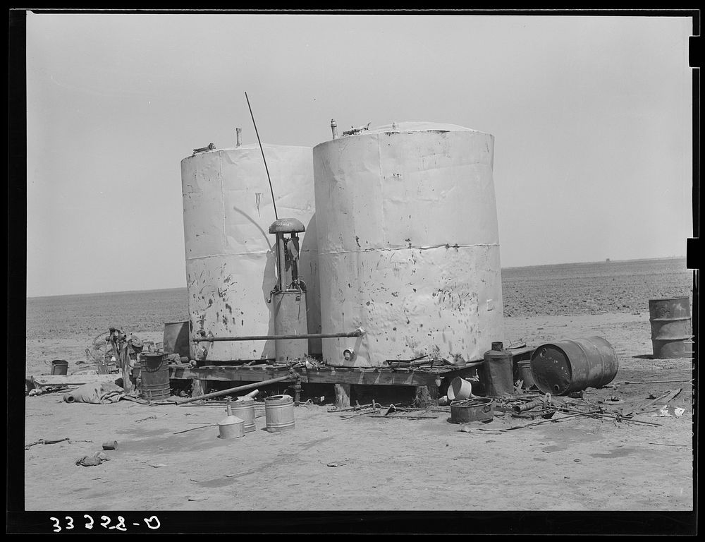 Gasoline storage tanks on 4900 acre farm near Ralls, Texas by Russell Lee
