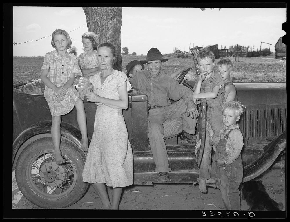 Group of agricultural day laborers in the Arkansas River bottoms near Vian. Oklahoma, Sequoyah County by Russell Lee