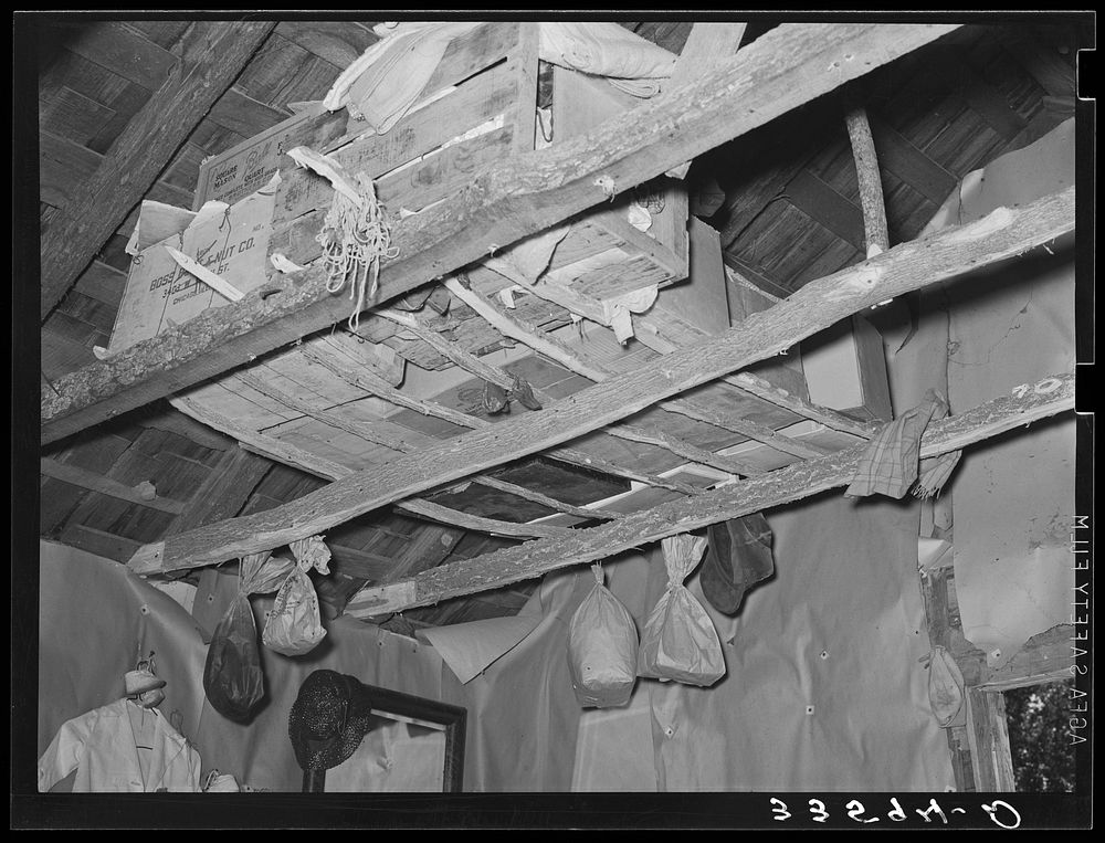 Storage of household goods in tenant home near Sallisaw, Oklahoma by Russell Lee