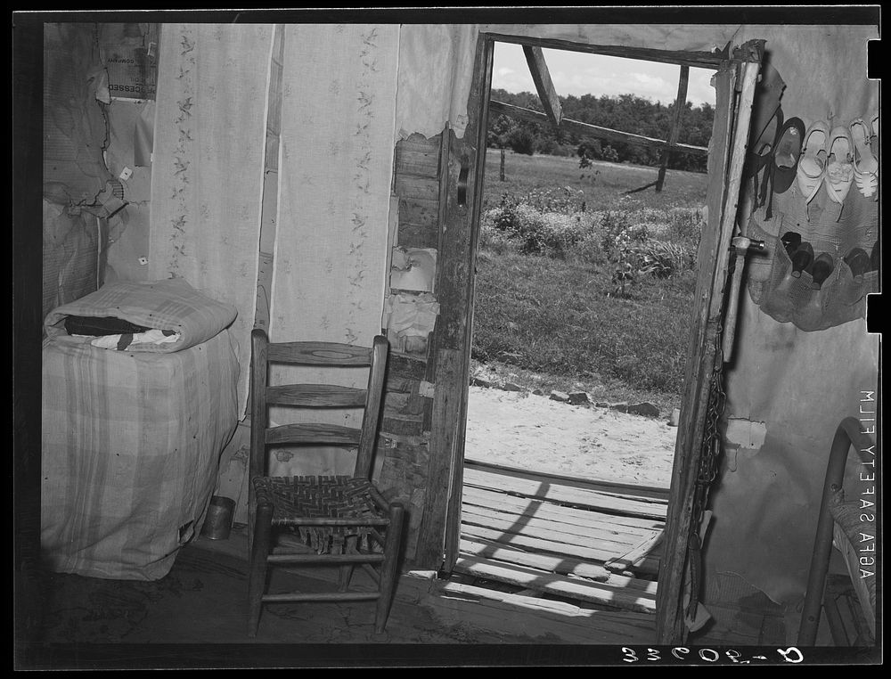Interior of  agricultural day laborer's home near Vian, Oklahoma. Sequoyah County by Russell Lee