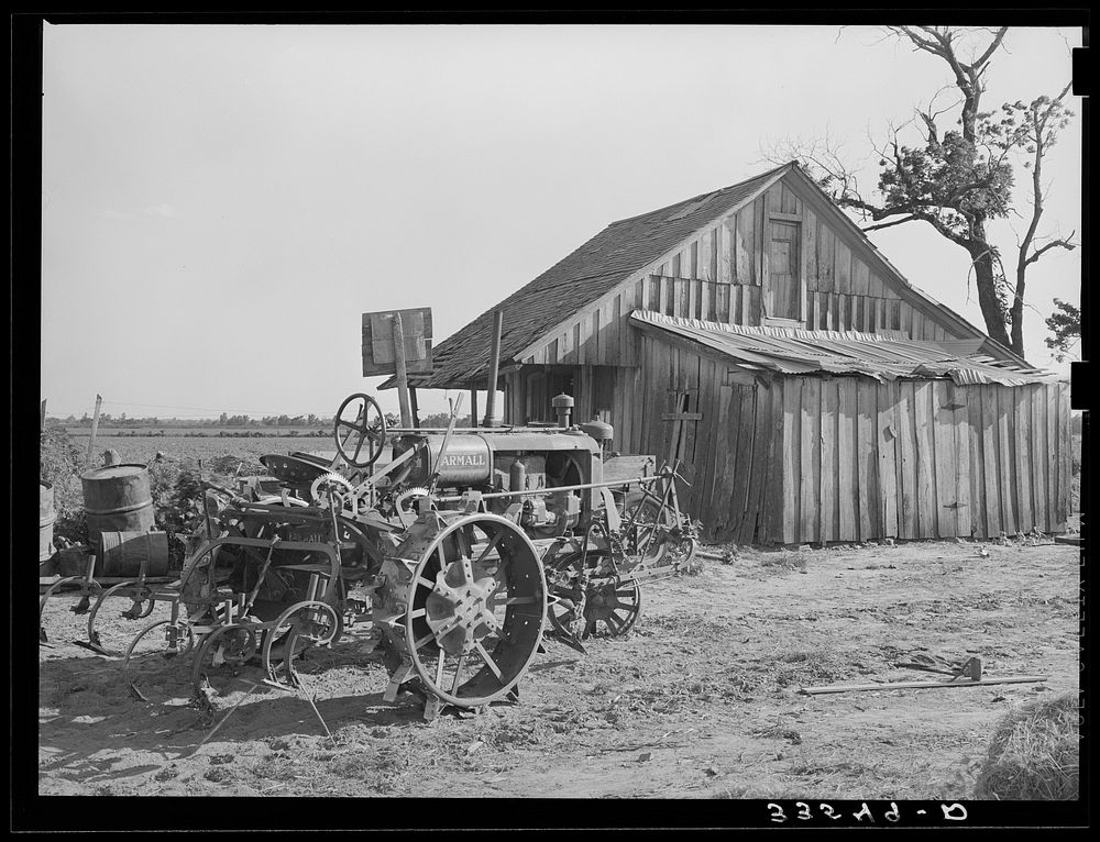 The tractor and home of a man who at one time was a tenant farmer but who is now a day laborer. Wagoner County, Oklahoma by…