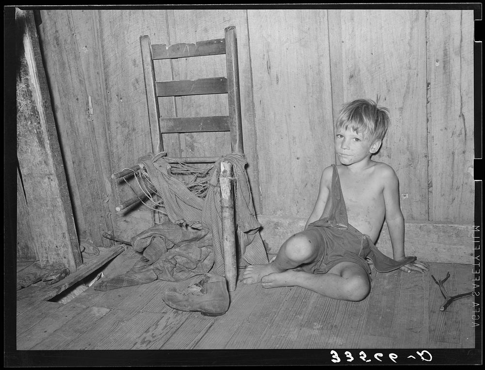 Son of agricultural day laborer living in McIntosh County, Oklahoma by Russell Lee