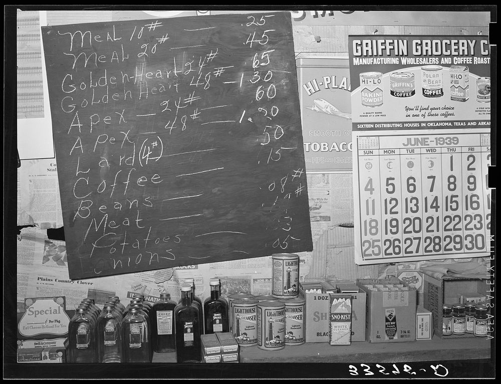 [Untitled photo, possibly related to: Price list of staples eaten by farmers in Wagoner County, Oklahoma] by Russell Lee