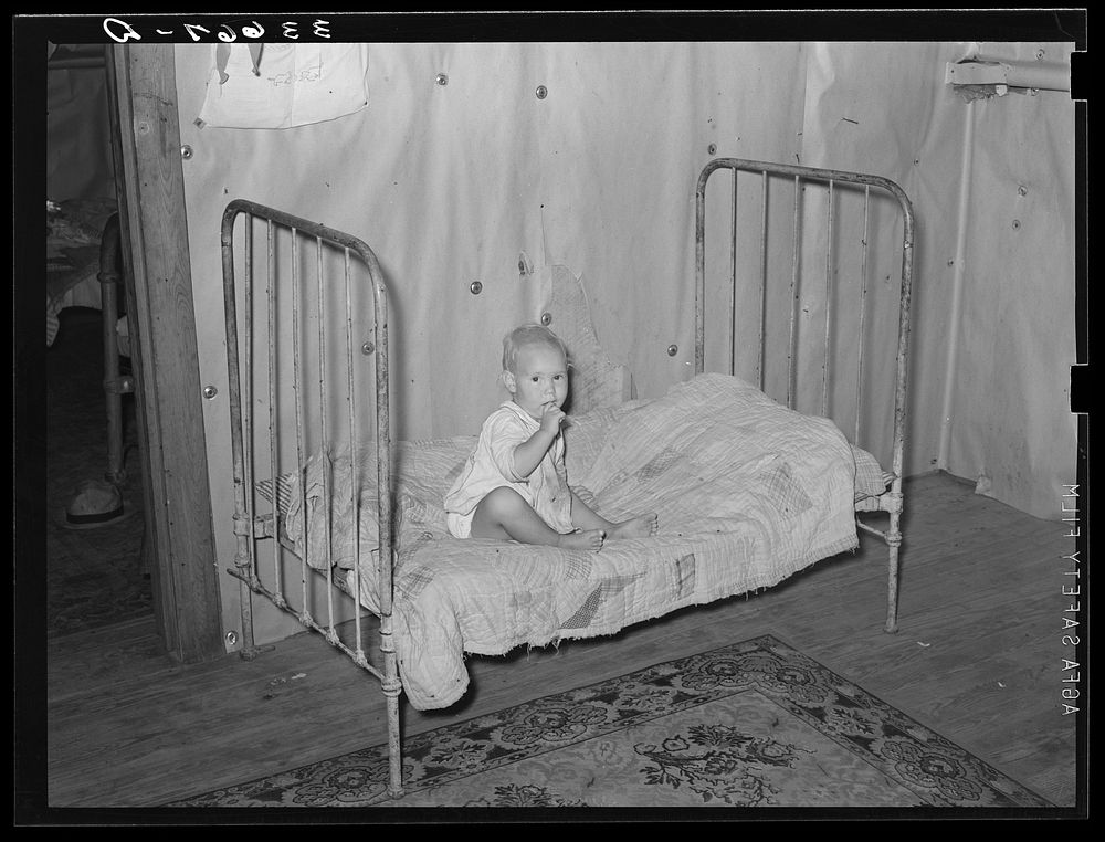 [Untitled photo, possibly related to: Child of tenant farmer. Arkansas River bottoms near Vian, Oklahoma] by Russell Lee