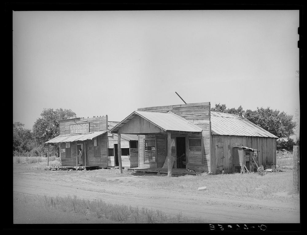 Old store in Akins, Oklahoma, now used as living quarters by Russell Lee