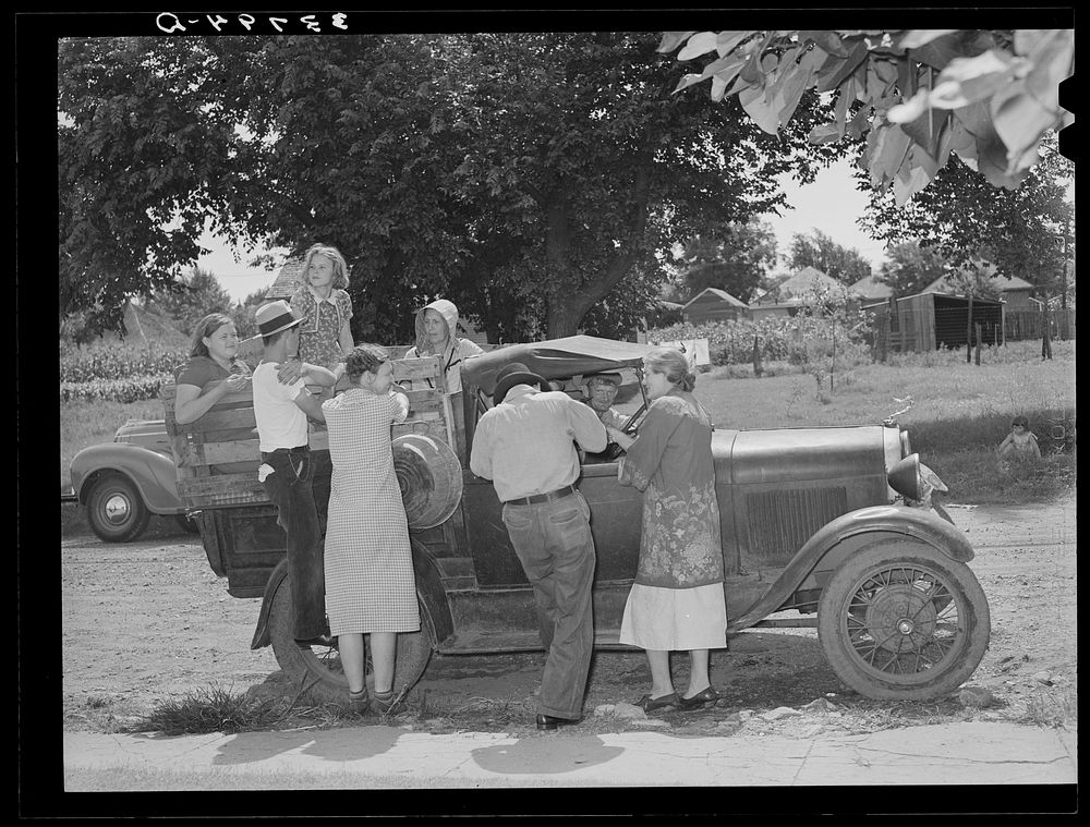 The Elmer Thomas family at Muskogee visiting their friends to say goodbye before leaving as migrants to California. Oklahoma…