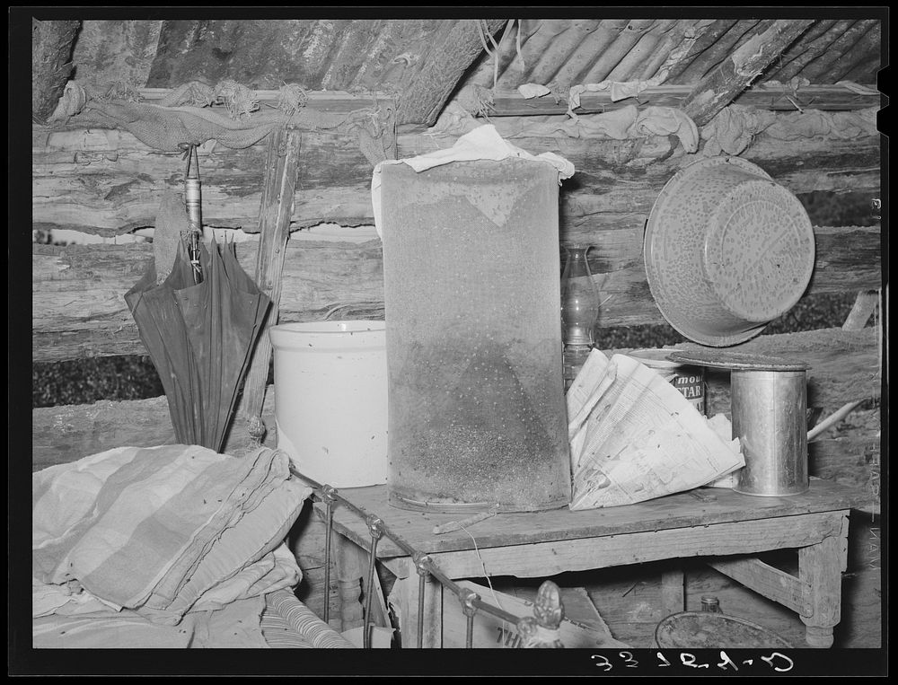Flytrap and household belongings of Indian agricultural worker. McIntosh County, Oklahoma by Russell Lee