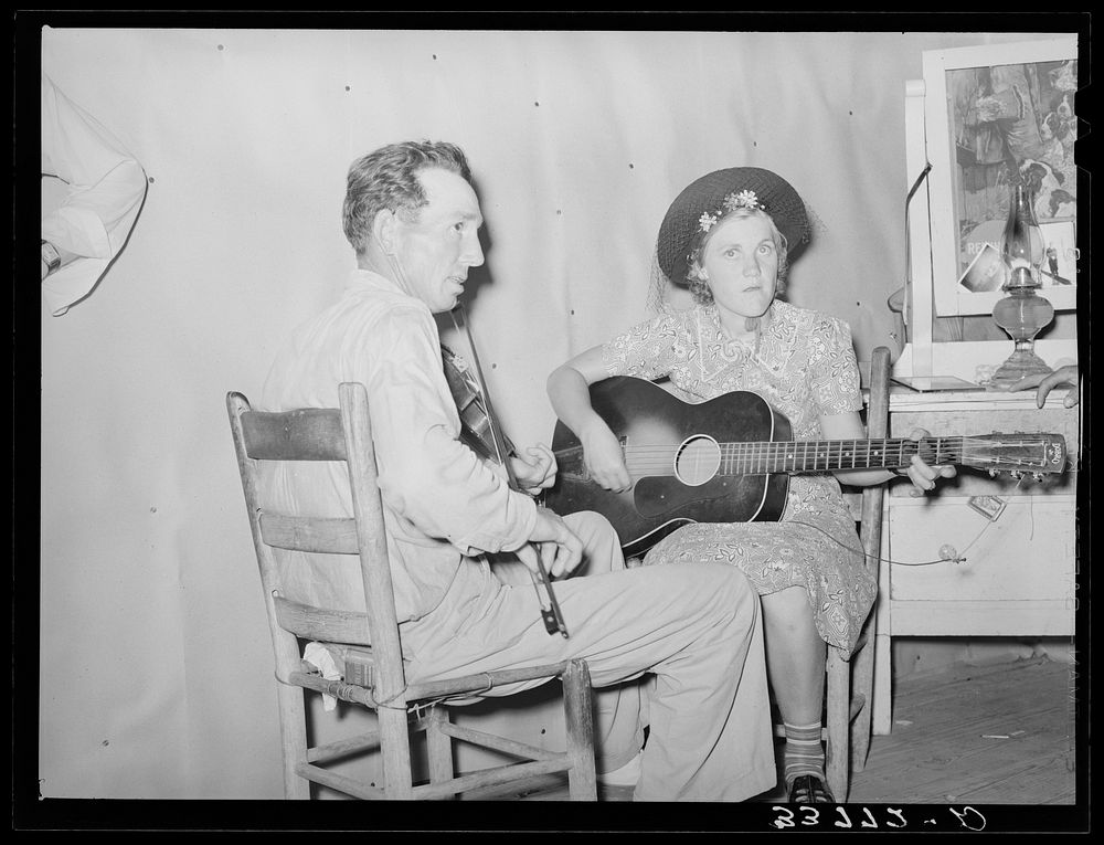 The band at square dance in rural section of hills near McAlester, Pittsburg County, Oklahoma. Sharecropper's home by…