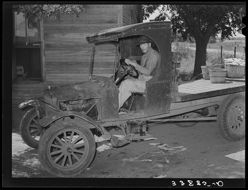 Tenant farmer in truck after returning from market in Muskogee, Oklahoma by Russell Lee