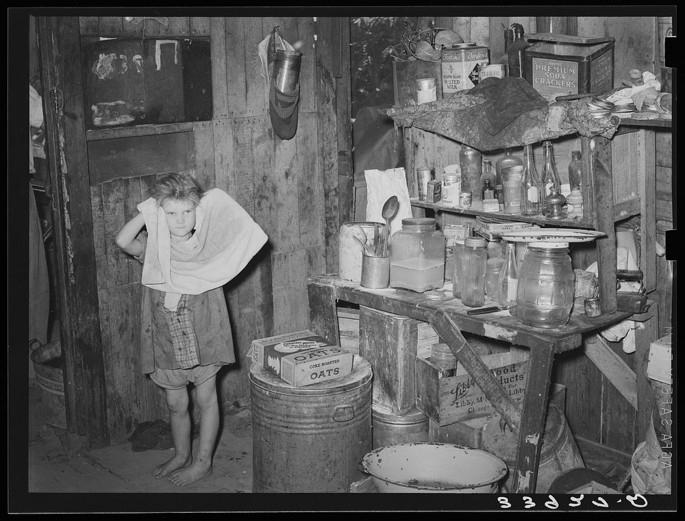 Interior of shack home of family living in camp near Mays Avenue. Oklahoma City, Oklahoma by Russell Lee