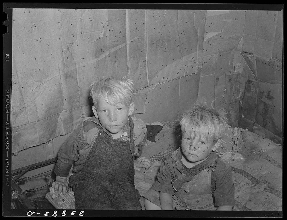 Children of Mays Avenue camp family in small shack used as sleeping quarters. Oklahoma City, Oklahoma. Refer to general…