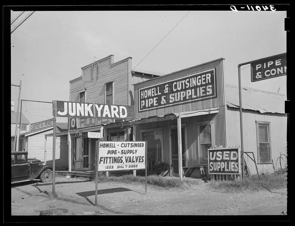Junkyard for oil supplies. Oklahoma City, Oklahoma by Russell Lee