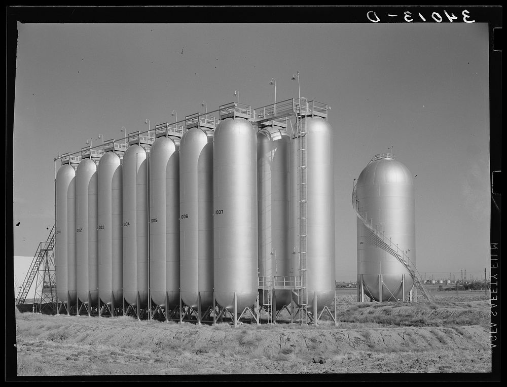 [Untitled photo, possibly related to: Gas tanks in oil field. Oklahoma City, Oklahoma] by Russell Lee