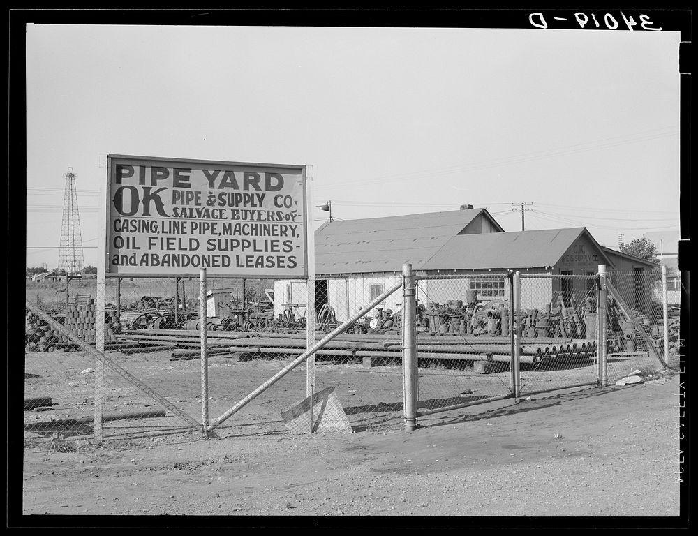 Oil field salvage lot and pipe yard. Oklahoma City, Oklahoma by Russell Lee