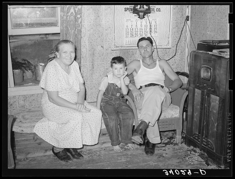 [Untitled photo, possibly related to: Truck driver, his mother and son at home. Seminole, Oklahoma, oil fields] by Russell…