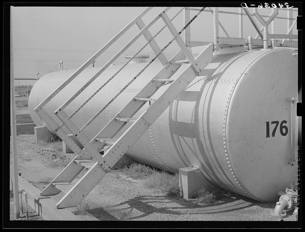 Seminole, Oklahoma. Storage tank and staircase of an oil refinery by Russell Lee