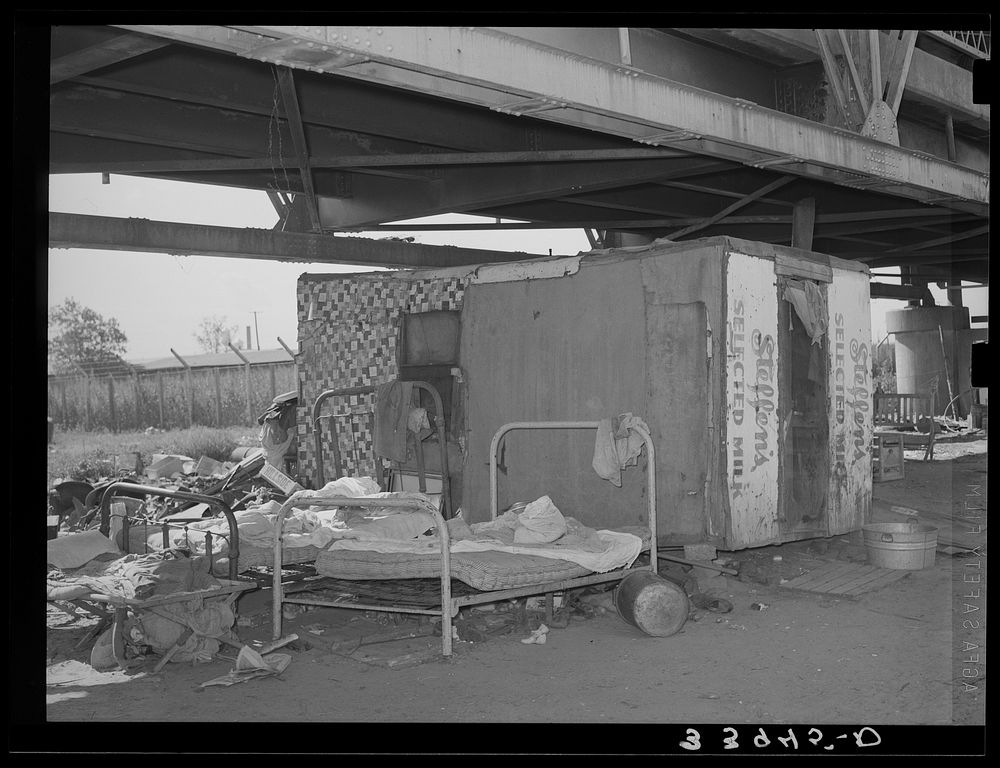 Shack home under Mays Avenue camp bridge. Oklahoma. See general caption no. 21 by Russell Lee
