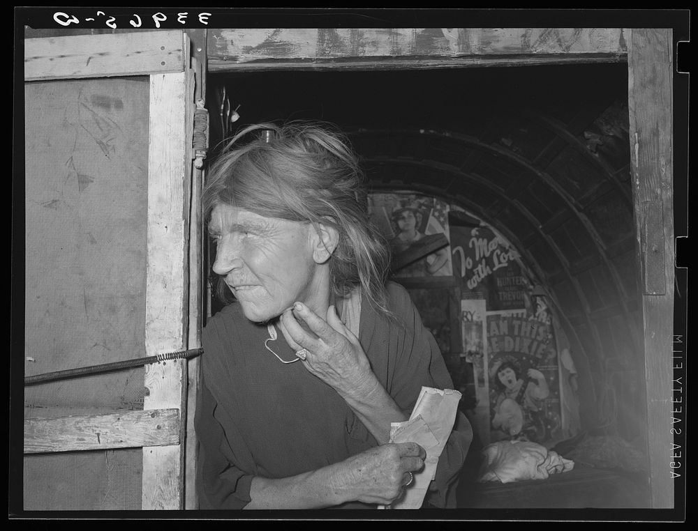 Woman living in camp near Mays Avenue. Oklahoma City, Oklahoma. Her husband has been denied work relief. He is a world war…