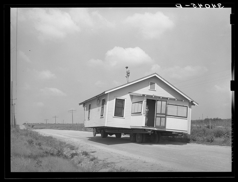 Moving a house. Seminole, Oklahoma by Russell Lee