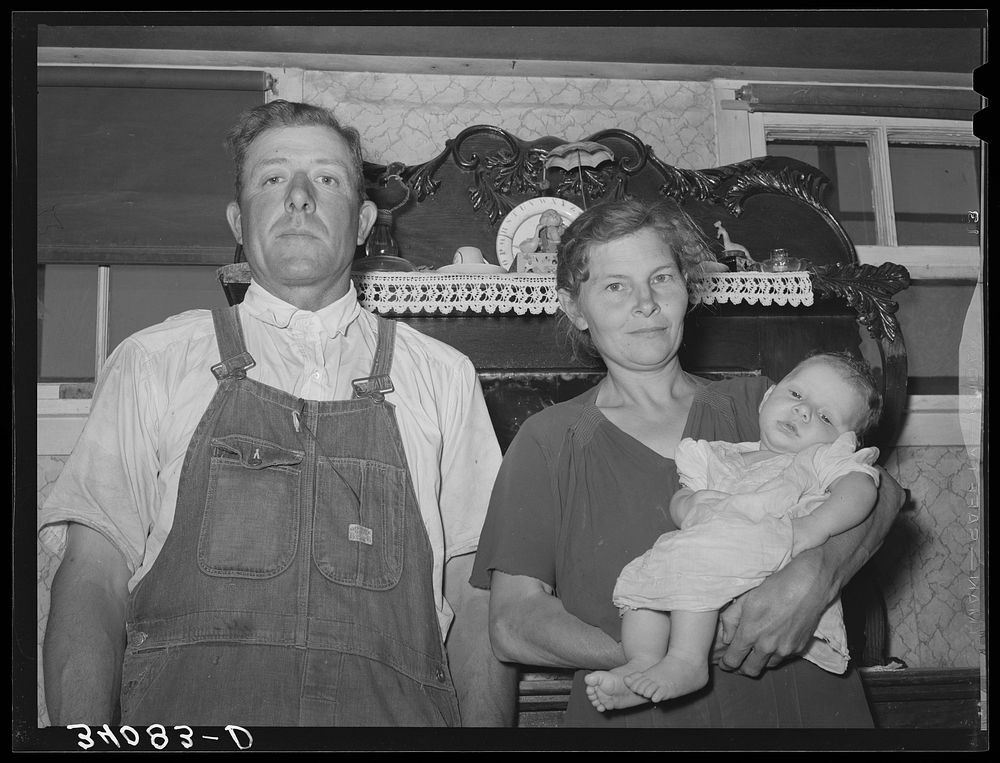 William Rall, wife and baby, FSA (Farm Security Administration) clients in Sheridan County, Kansas by Russell Lee