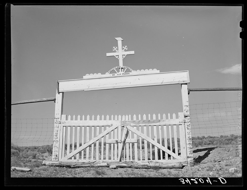Entrance to Catholic cemetery. Questa, New Mexico by Russell Lee