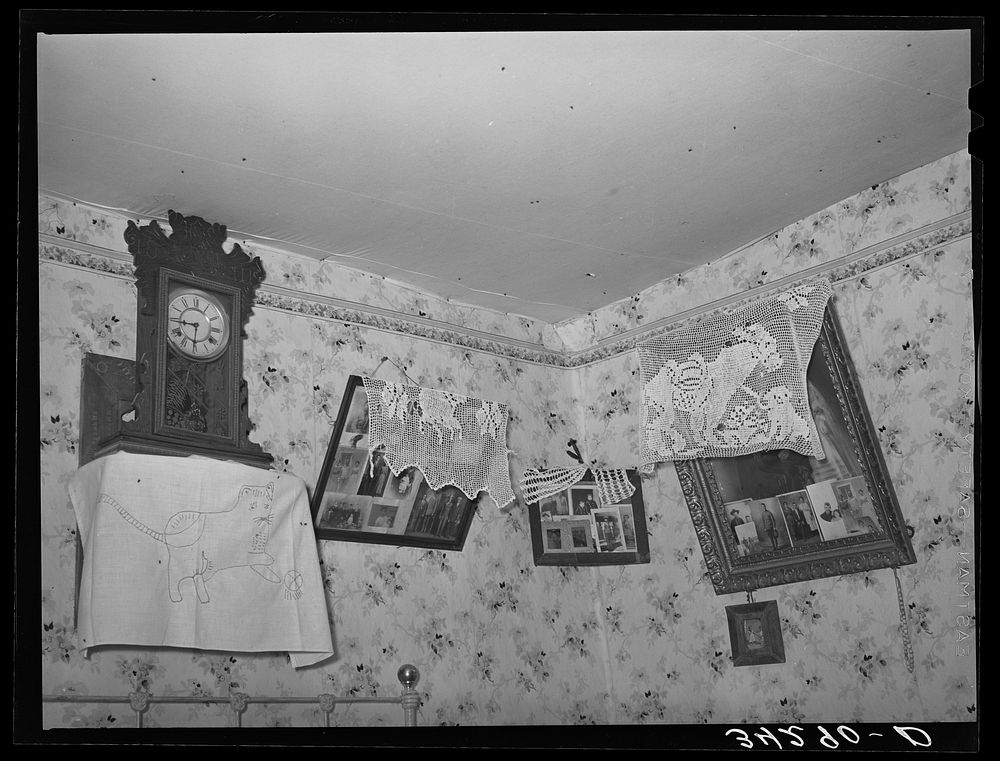 Corner of living room of Spanish-American family near Taos, New Mexico. Notice lace decorations by Russell Lee