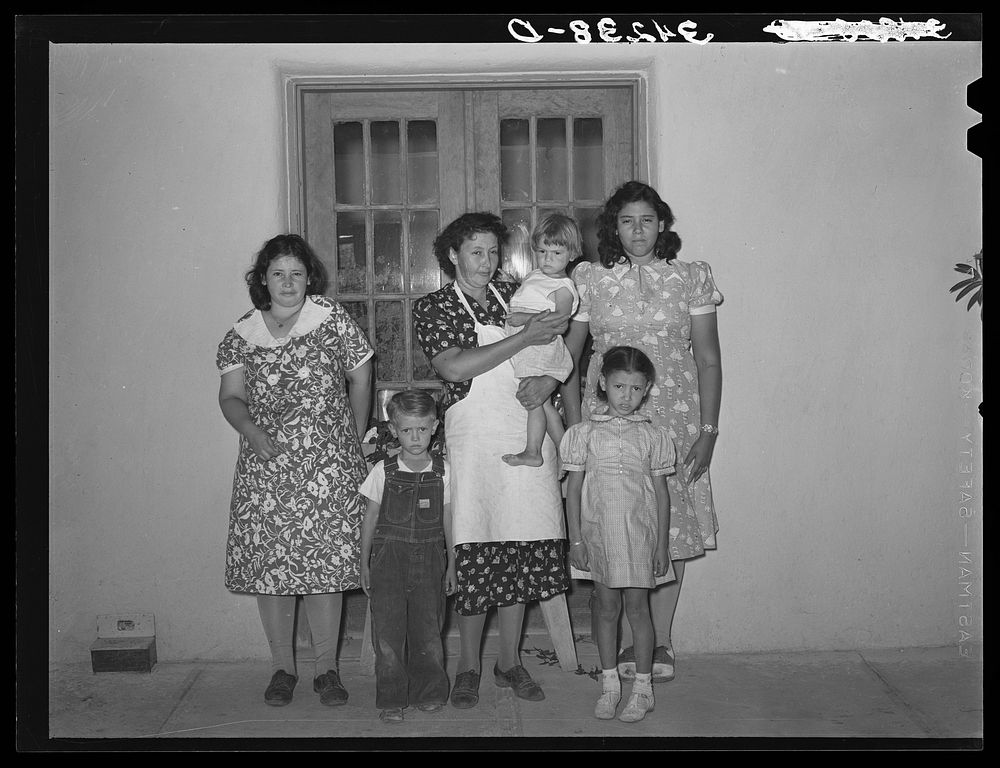 Spanish-American mother with her children near Taos, New Mexico by Russell Lee