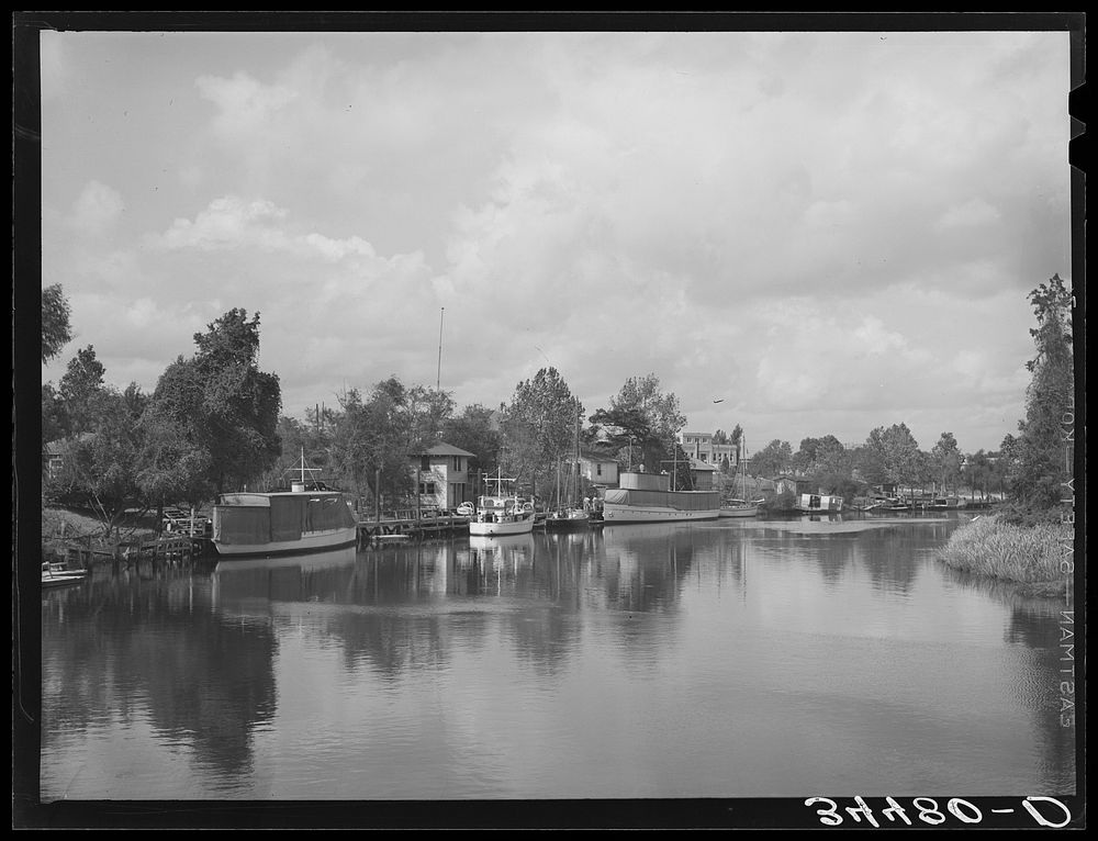 Former main ship channel of the port of Houston, Texas. This is now a yacht pen by Russell Lee