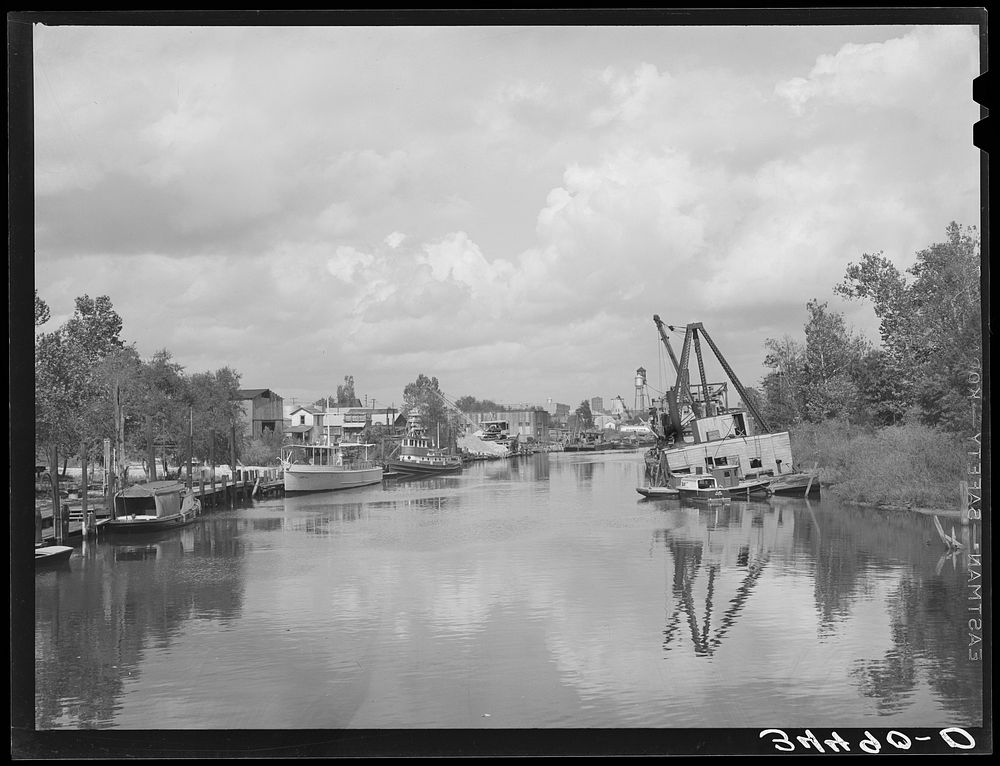 View of former main ship channel, now yacht pen. Port of Houston, Texas, harbor by Russell Lee