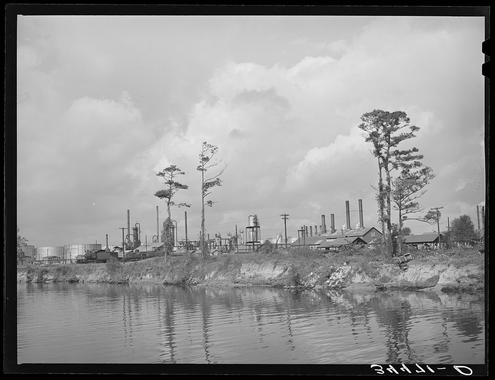 Oil refinery on the bank of the ship channel. Port of Houston, Texas by Russell Lee