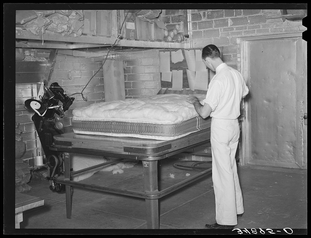 Mattress before cover is put on. Mattress factory. San Angelo, Texas by Russell Lee