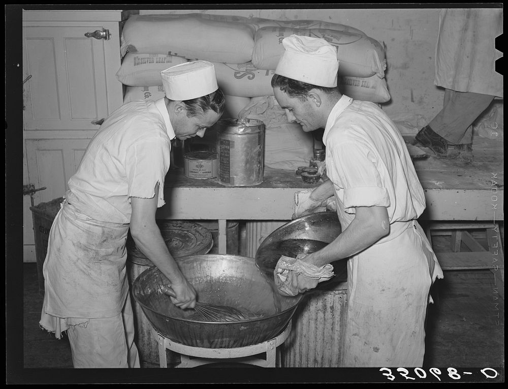 Bakers making filling for pies. San Angelo, Texas by Russell Lee