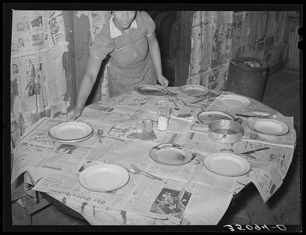 Table being set for supper. House of Pomp Hall, tenant farmer. Creek County, Oklahoma. See general caption number 23 by…