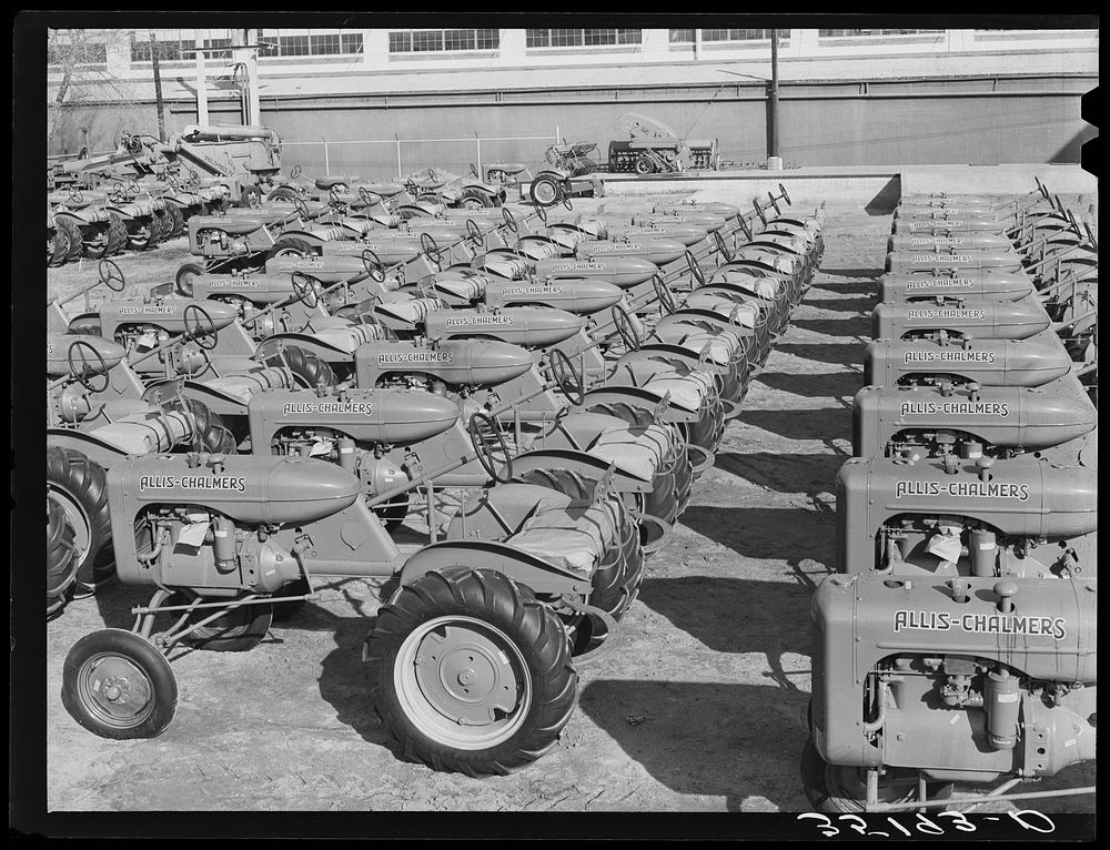 Tractors at farm equipment warehouse. Oklahoma City, Oklahoma by Russell Lee