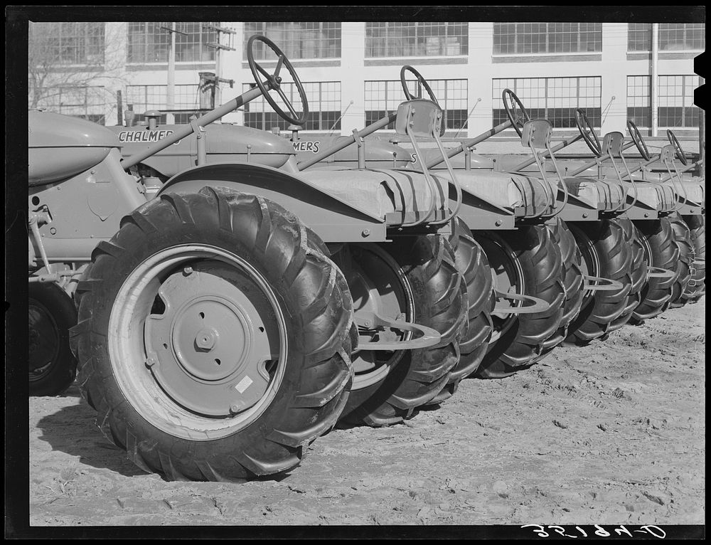 Tractors at farm equipment warehouse. Oklahoma City, Oklahoma by Russell Lee