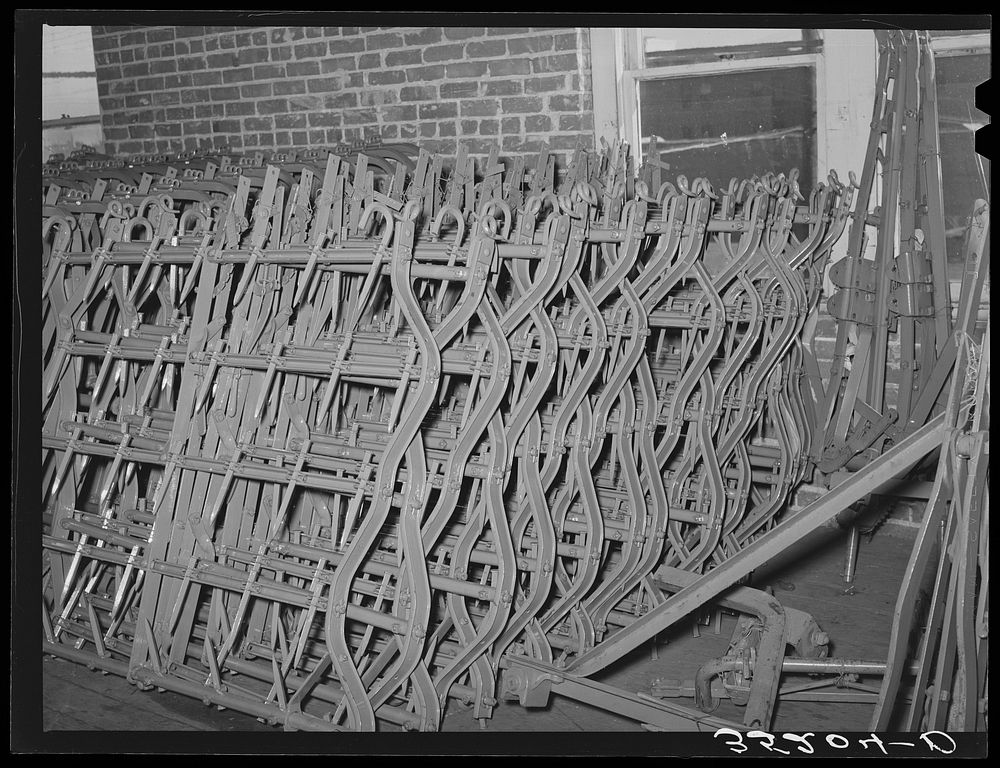 Spike-tooth harrow parts. Farm equipment warehouse, Oklahoma City, Oklahoma by Russell Lee