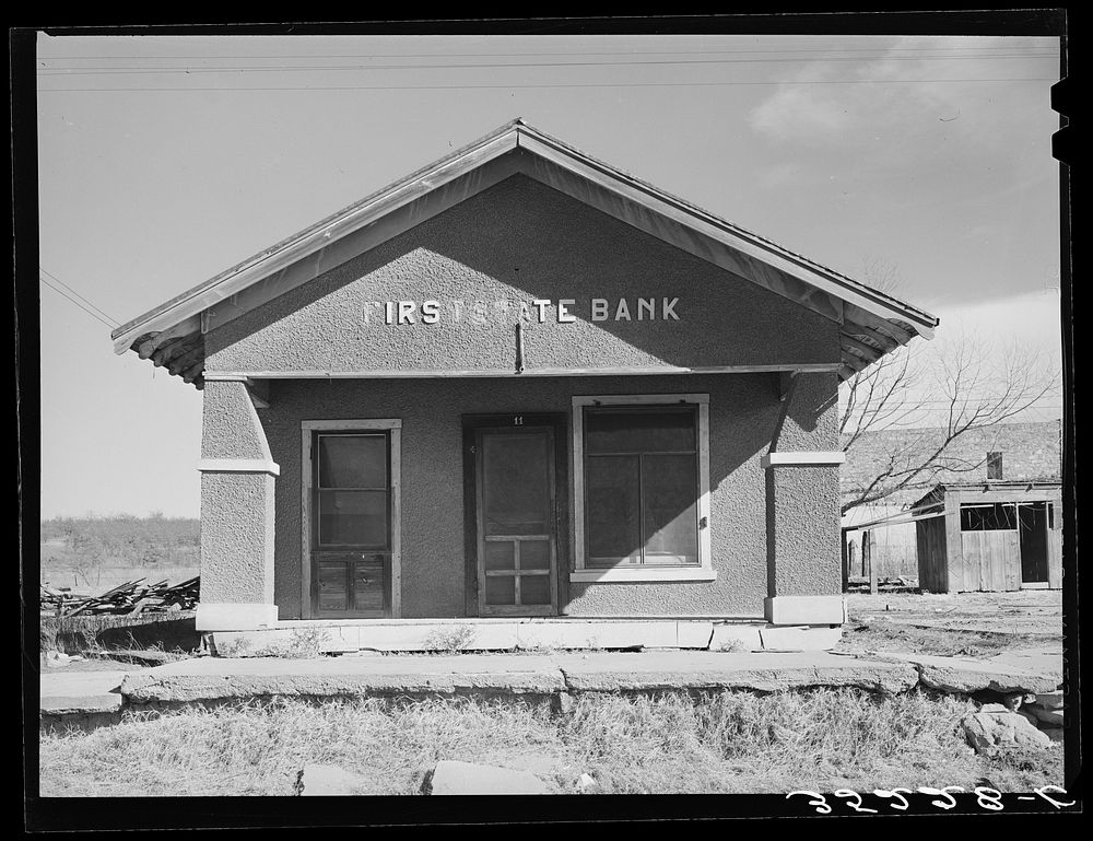 [Untitled photo, possibly related to: Deserted bank building in the oil ghost town of Slick, Oklahoma] by Russell Lee