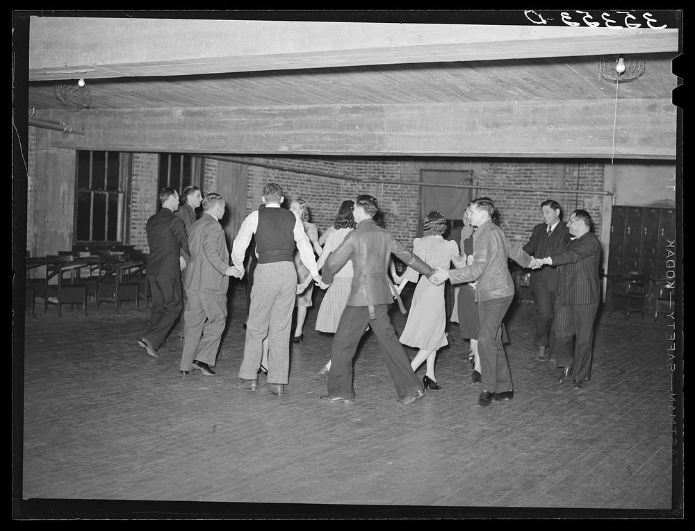 Dancing a Paul Jones at Jaycee buffet supper and party in Eufaula, Oklahoma. See general caption number 25 by Russell Lee