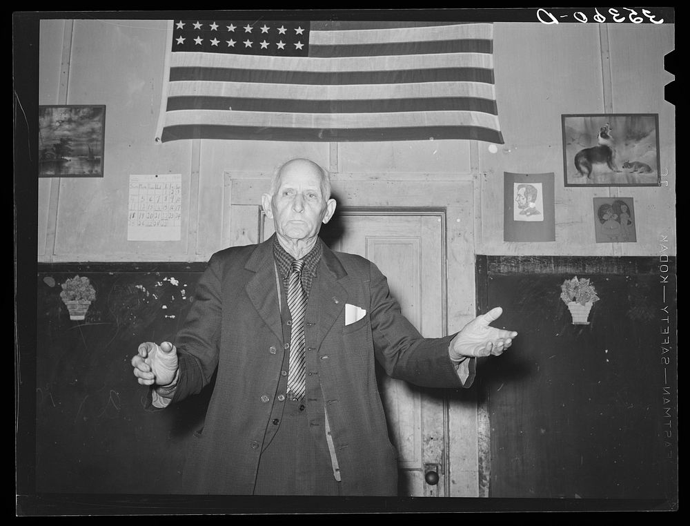 Colonel Lilly, auctioneer at pie supper. McIntosh County, Oklahoma. See general caption number 24 by Russell Lee