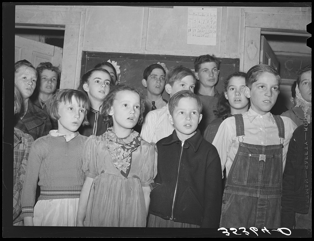 Schoolchildren singing at pie supper in Muskogee County, Oklahoma. See general caption number 24 by Russell Lee