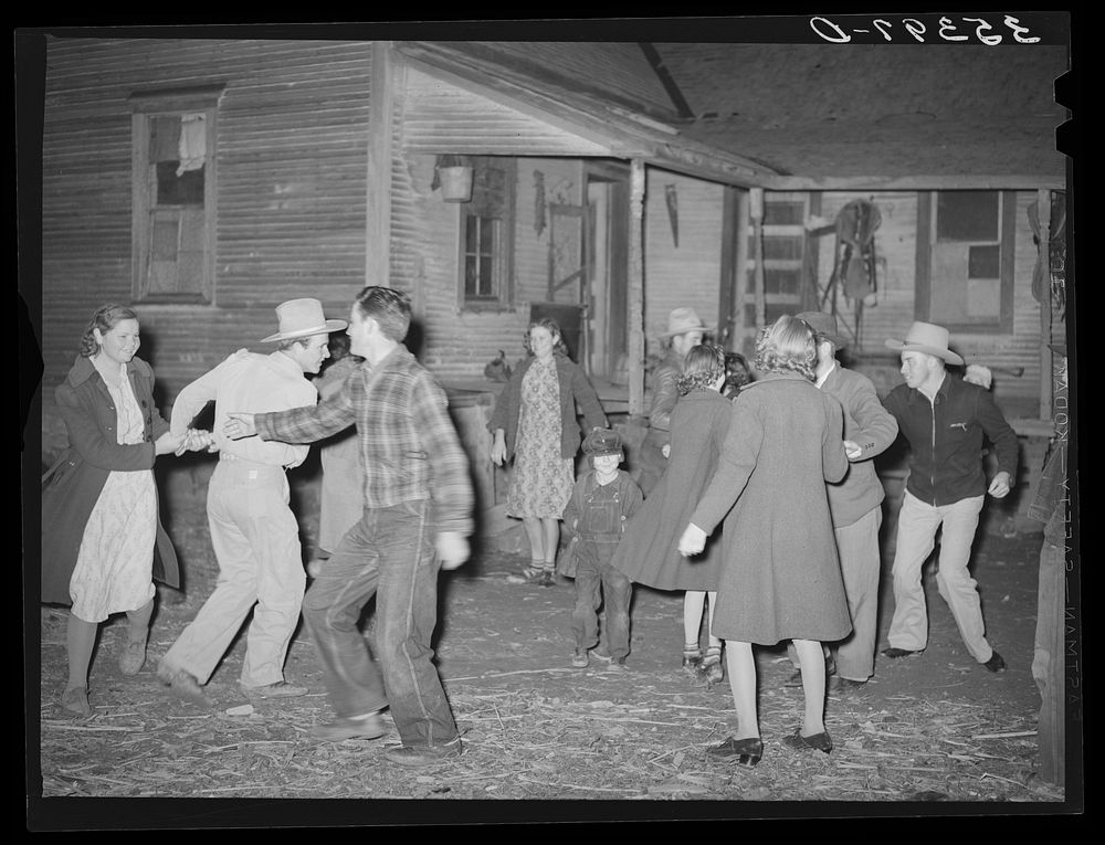 Swing game at play party in McIntosh County, Oklahoma. See general caption 26 by Russell Lee
