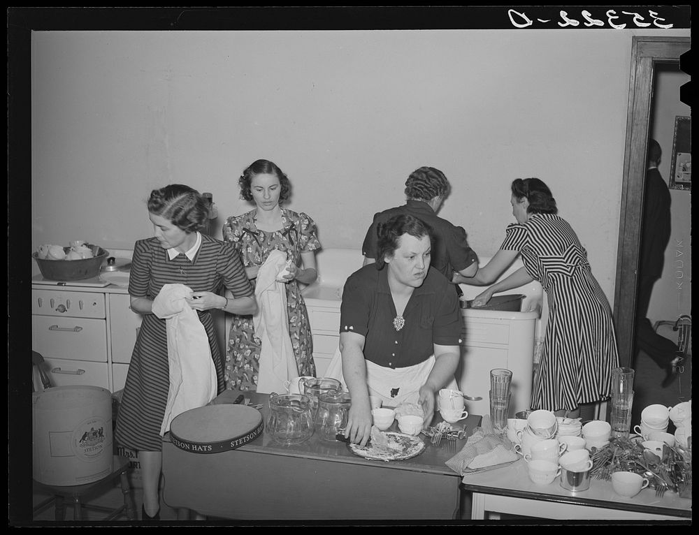 Wives of the Jaycees washing and drying dishes after supper in high school. Eufaula, Oklahoma. See general caption number 25…