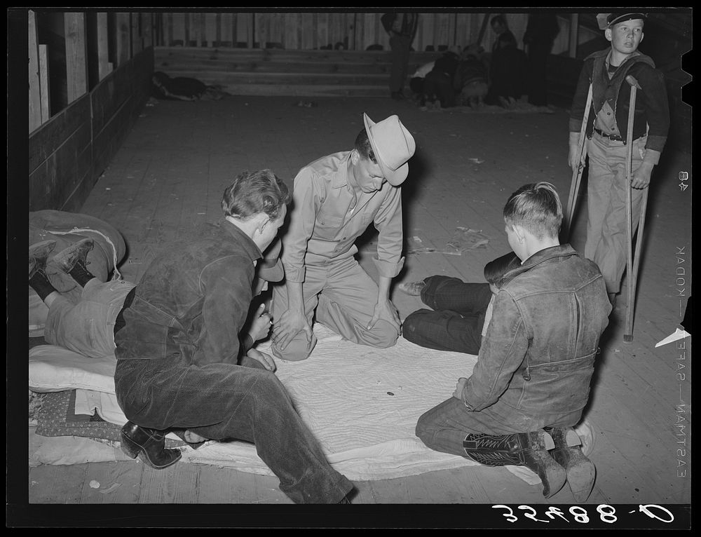 Boys in a crap game at the San Angelo Fat Stock Show. San Angelo, Texas by Russell Lee