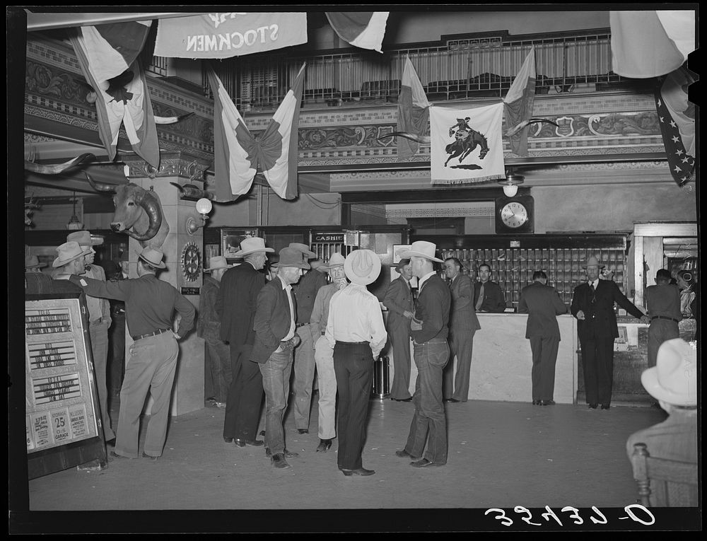 Group of west Texas cattlemen in the hotel lobby during the San Angelo Fat Stock Show. San Angelo, Texas by Russell Lee