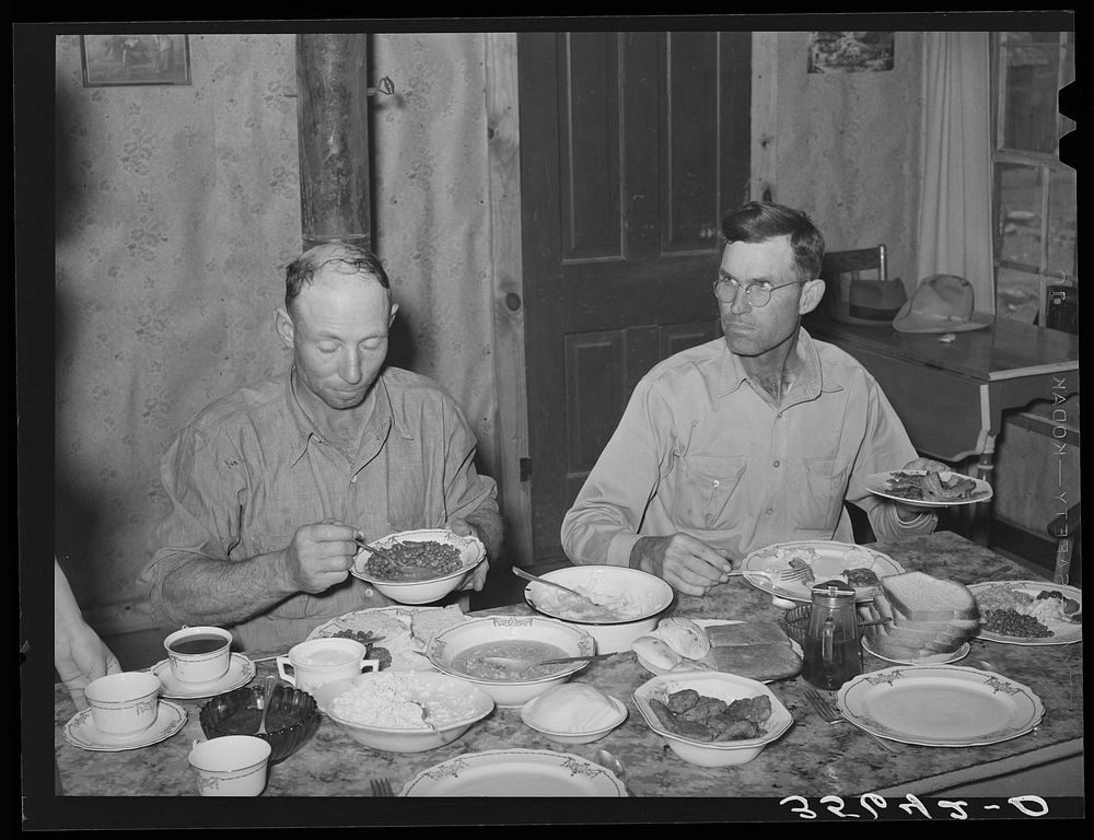 Dinner in the home of a rehabilitation borrower during goat shearing and kidding season. Man on the right is rehabilitation…