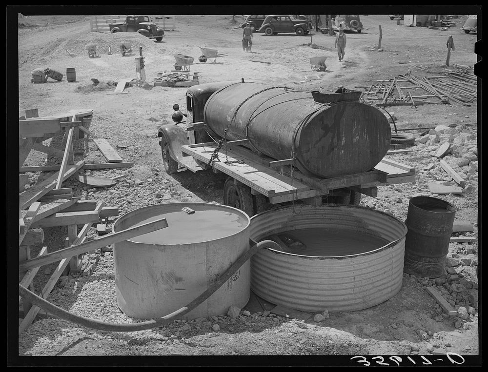 Water tank truck at road workers' camp in Menard County, Texas by Russell Lee