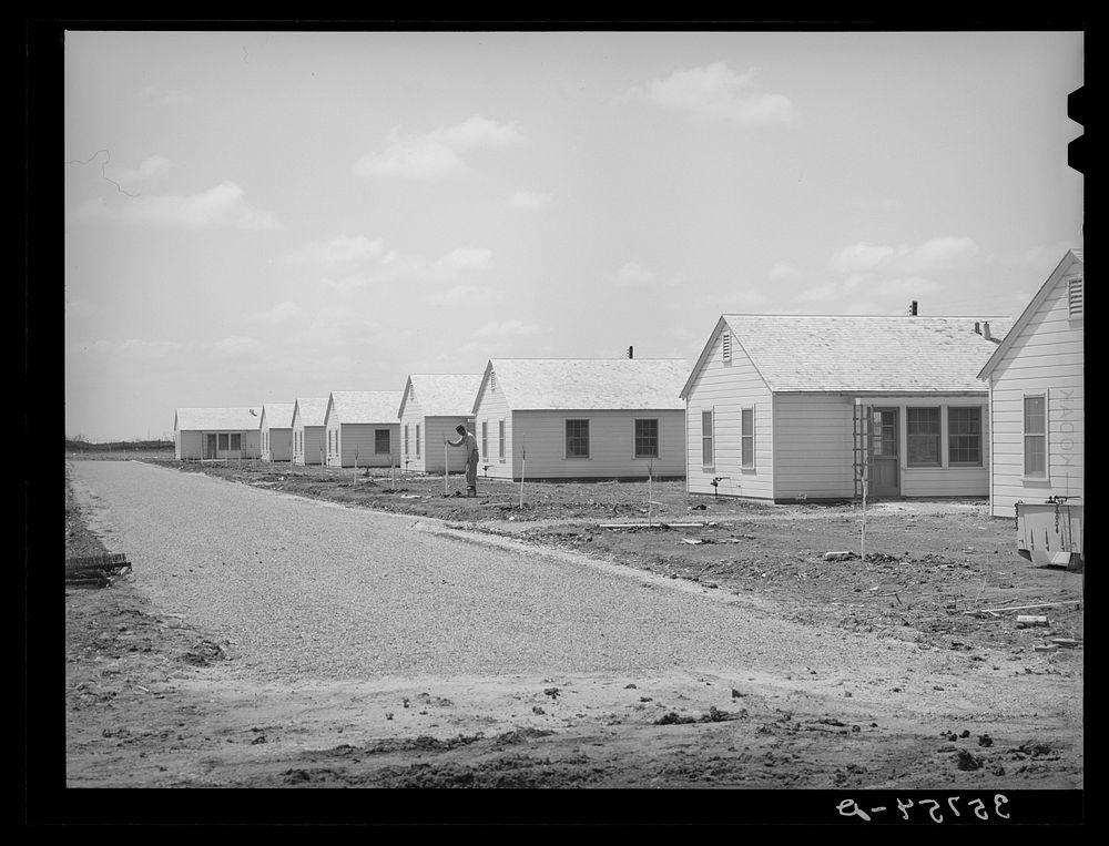 Houses for permanent agricultural workers at the migratory labor camp at Robstown, Texas by Russell Lee