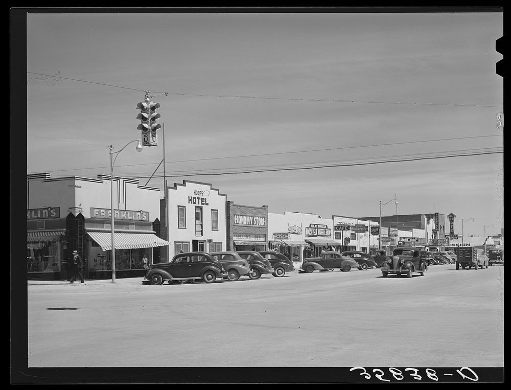 Main street in the oil boom town of Hobbs, New Mexico by Russell Lee