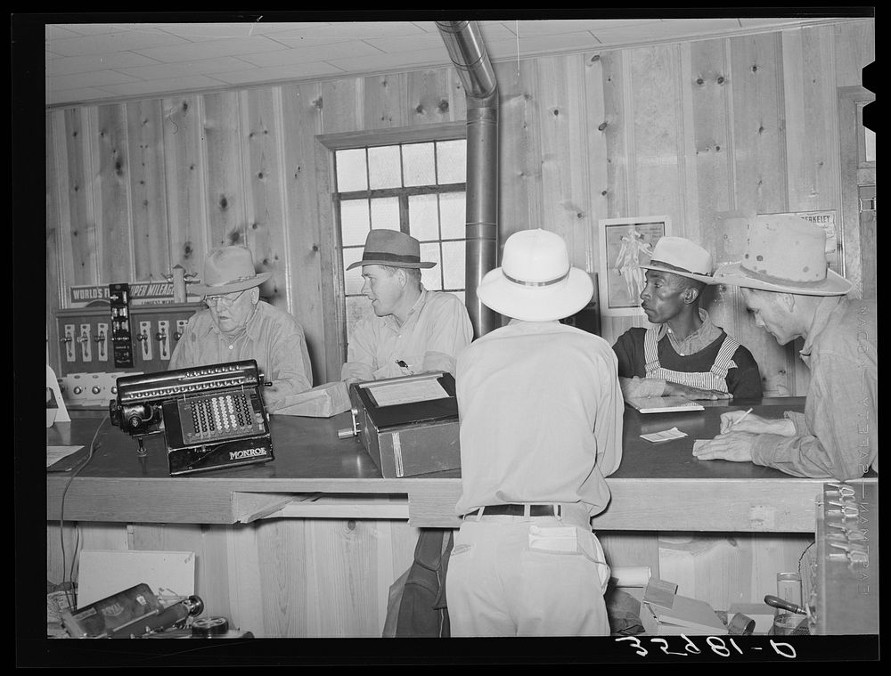 Members of the United Producers and Consumers Cooperative in one of the offices of the association. This cooperative is open…
