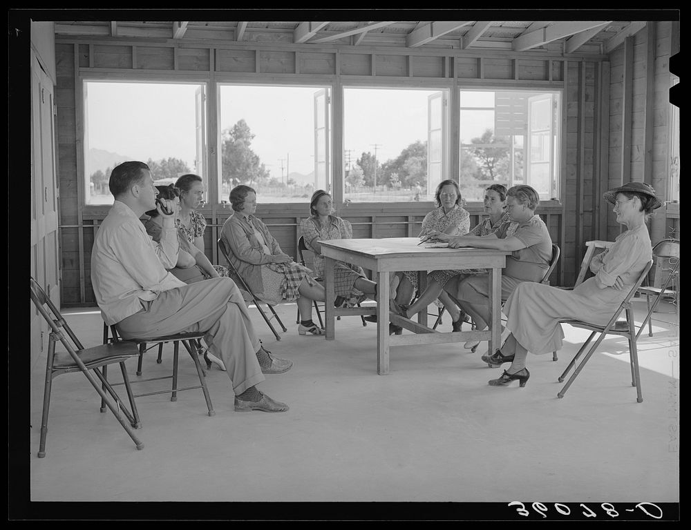 Meeting of the Ladies Aid Society with the camp manager at the Agua Fria migratory labor camp, Arizona. The Ladies Aid…